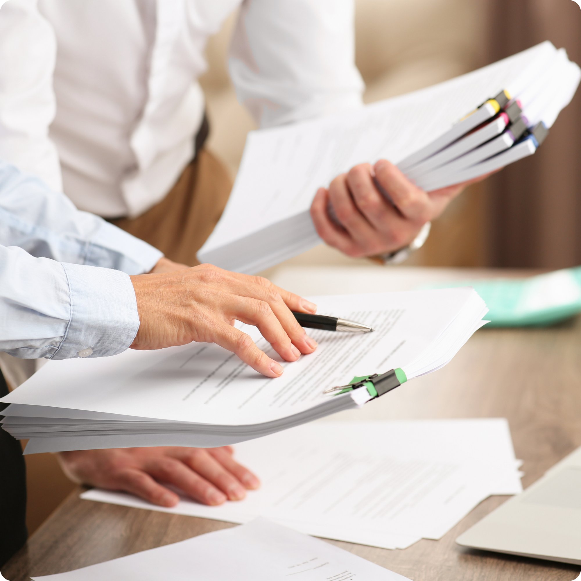 man pointing to book