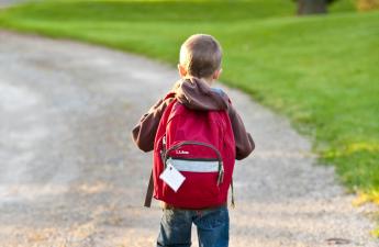 Boy with Red Backpack